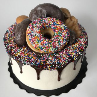 donut cake, buttercream icing, sprinkles, chocolate ganache